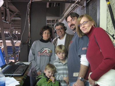 In the broadcast booth with fans of the team