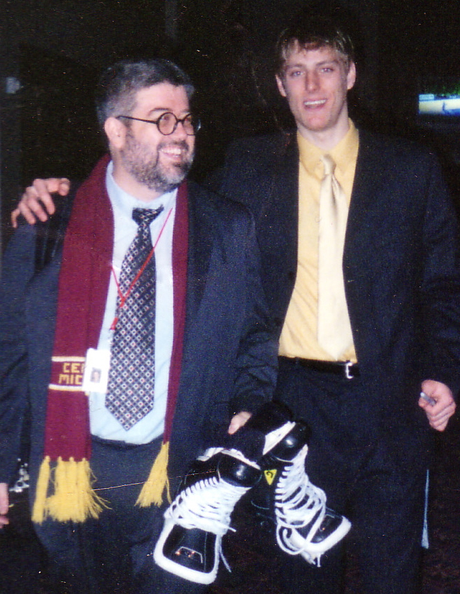 Heading to the post game interview with goalie Jeff Weber